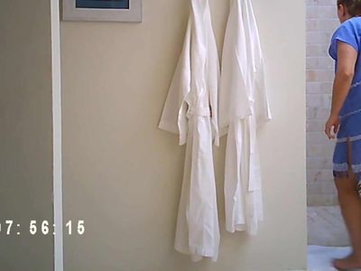 voyeur unaware MILF in the shower