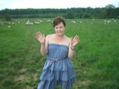 Small titted milf walking nude with the sheep