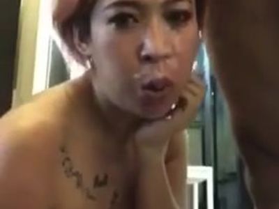 Mature Thai MILF receive a massive facial