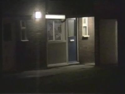 Neighbour towelling in window, naked