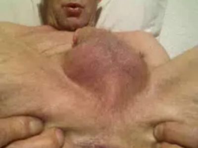 naked male spreading asshole wide open and fingering hole close up