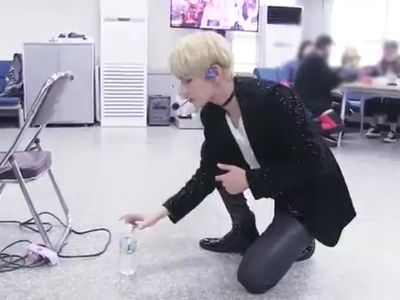 sexy boy flips water bottle