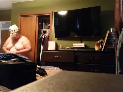 See fat woman with hat on cleaning the dresser nude