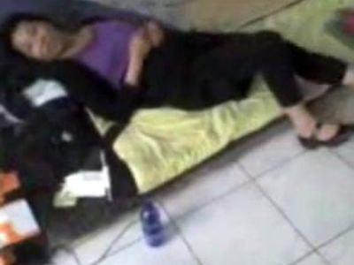 Chinese mature wife in shower.