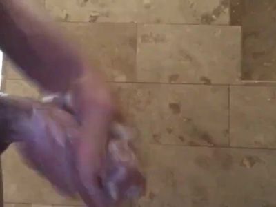 In the shower stroking my hard cock