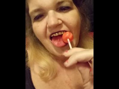 MILF drools over lollipop wishing it was your cock she was sucking!