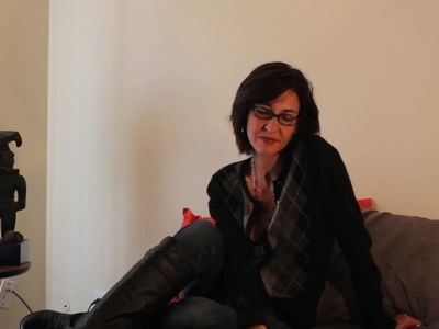 Ms Daphne Smokes in her Boots over Jeans. Smoking MILF.